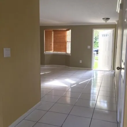 Rent this 2 bed townhouse on 13468 Georgian Court in Wellington, FL 33414