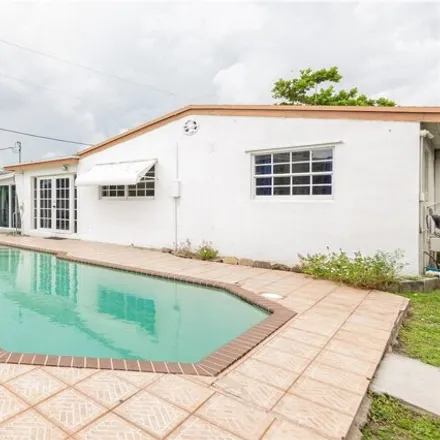 Buy this 4 bed house on 556 Southwest 28th Avenue in Fort Lauderdale, FL 33312