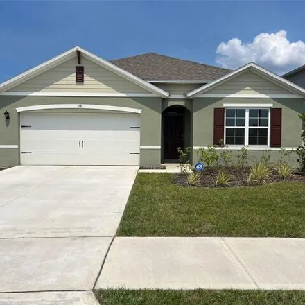 Buy this 4 bed house on 1281 Red Hill Rd in Davenport, Florida