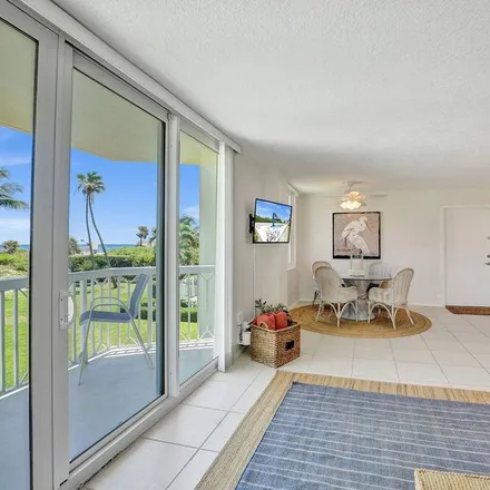 Rent this 3 bed condo on Palm Beach Shores