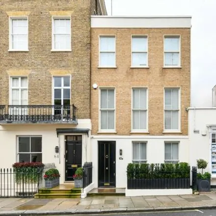 Buy this 4 bed townhouse on Eaton Mews South in London, SW1W 9HJ