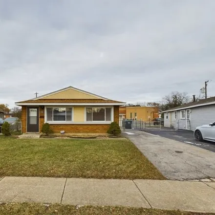 Rent this 3 bed house on 3116 Emery Ln in Robbins, Illinois