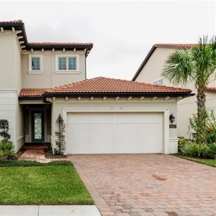 Rent this 4 bed house on 10463 Royal Cypress Way in Orlando, Florida