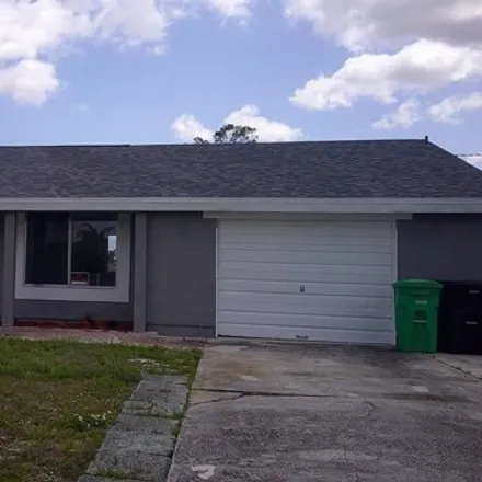Buy this 3 bed house on 2353 Southeast Aneci Street in Port Saint Lucie, FL 34984