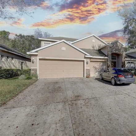 Buy this 4 bed house on 13733 Covey Run Place in Spring Hill, FL 34609