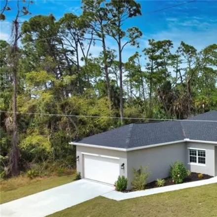 Buy this 3 bed house on Placid Avenue in Port Charlotte, FL 33948