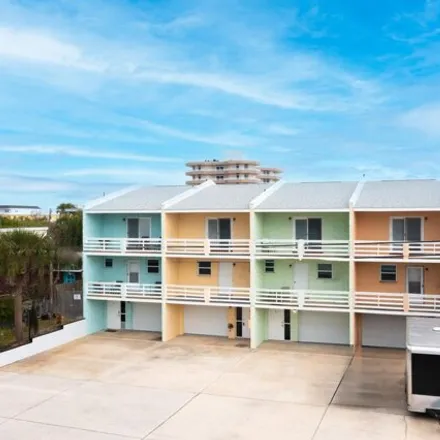 Buy this 8 bed townhouse on 3635 Cardinal Boulevard in Daytona Beach Shores, Volusia County