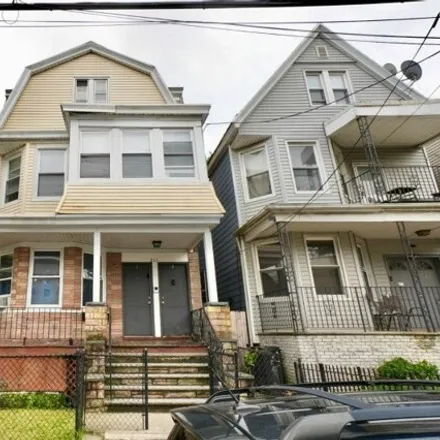 Buy this 6 bed house on 211 Wilkinson Ave in Jersey City, New Jersey