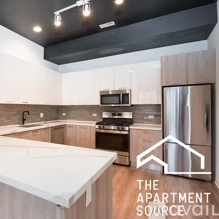 Rent this 3 bed apartment on 2550 S Wabash Ave