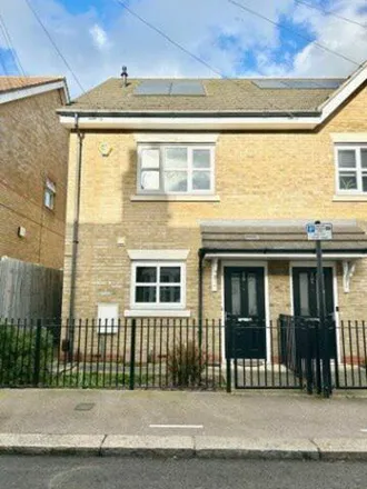 Rent this 3 bed townhouse on Station Road in 33 Garfield Road, London