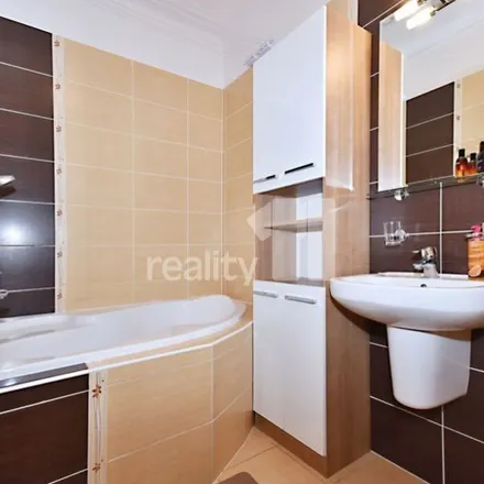Rent this 3 bed apartment on Rýmařovská 430 in 199 00 Prague, Czechia