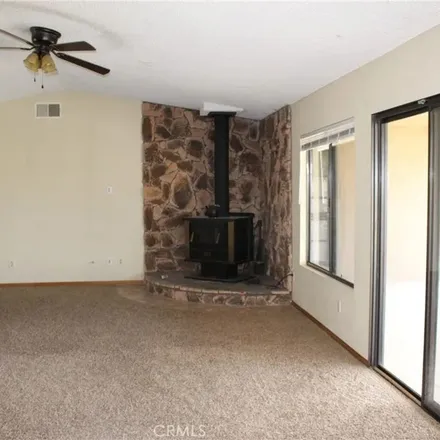 Rent this 3 bed apartment on 22386 Loch Lomond Drive in Canyon Lake, CA 92587