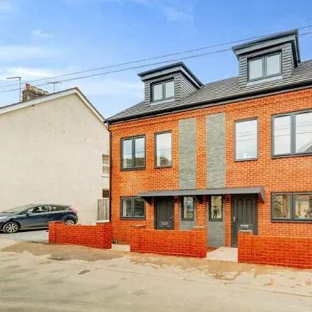 Buy this 4 bed townhouse on 24 Wellington Town Road in East Grinstead, RH19 2ES