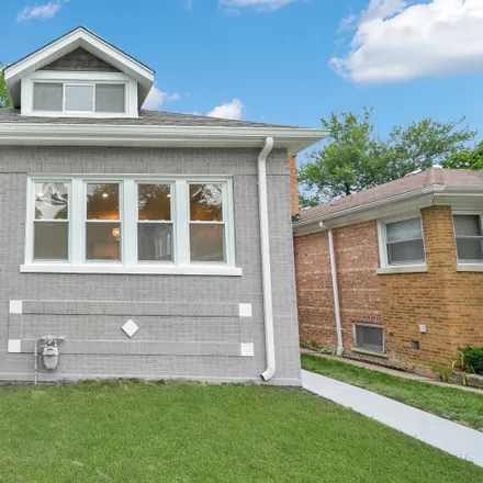 Buy this 3 bed house on 1418-1420 West 105th Place in Chicago, IL 60643