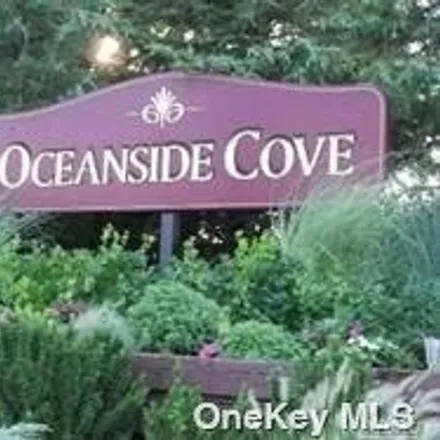 Buy this studio apartment on Center Cove Drive in Oceanside, NY 11572