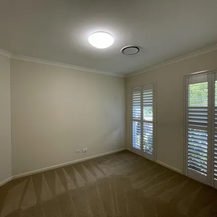 Rent this 4 bed apartment on 55 Sovereign Circuit in Pelican Waters QLD 4551, Australia