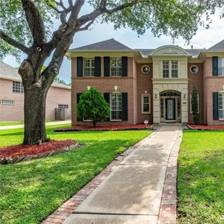Buy this 5 bed house on 4112 North Pine Brook Way in Houston, TX 77059