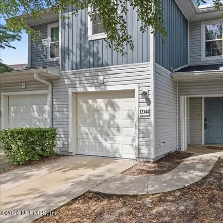 Rent this 3 bed townhouse on 12372 Mangrove Forest Court in Jacksonville, FL 32218