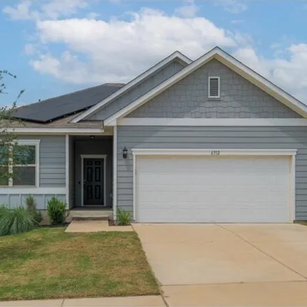Rent this 4 bed house on 6312 Routenburn Street in Austin, TX 78754