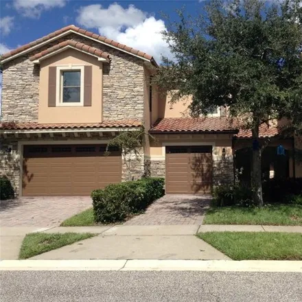 Rent this 2 bed townhouse on 8401 Kelsall Drive in Orange County, FL 32832