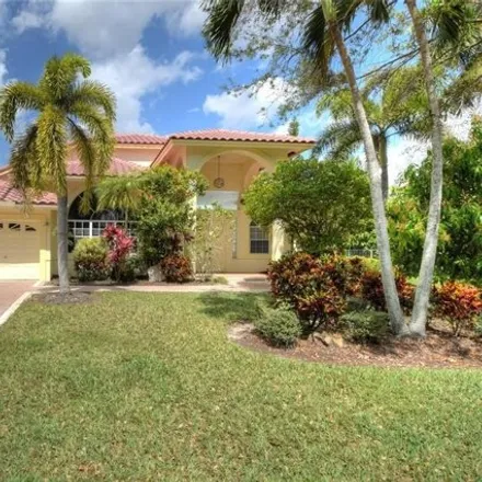 Buy this 5 bed house on 12113 Northwest 10th Manor in Coral Springs, FL 33071