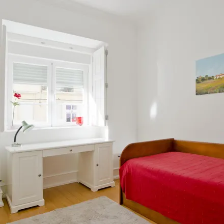 Rent this 2 bed room on Magazin Romanesc- Mini-mercado do Leste in Rua Carlos Mardel 149, 1900-303 Lisbon