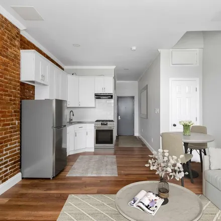 Rent this 1 bed townhouse on 125 West 123rd Street in New York, NY 10027