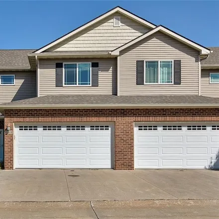 Buy this 3 bed townhouse on 8303-8309 Wilden Drive in Urbandale, IA 50322