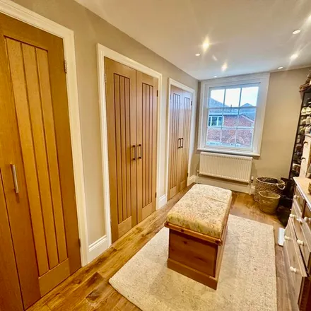 Rent this 3 bed townhouse on Illusion Hair Salon in 53 Winchester Street, Salisbury