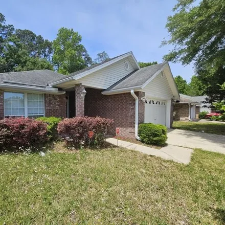 Rent this 4 bed house on 7316 Ironside Drive West in Jacksonville, FL 32244