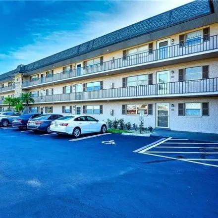 Buy this 2 bed condo on 5459 Rattlesnake Hammock Road in Lely Country Club, Collier County