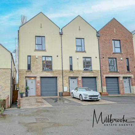 Rent this 3 bed townhouse on 12 Chaddock Hall Drive in Mosley Common, M28 1FE