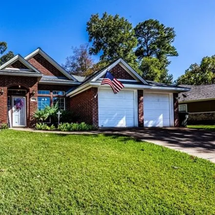 Buy this 3 bed house on 1872 Rollingwood Drive in Huntsville, TX 77340