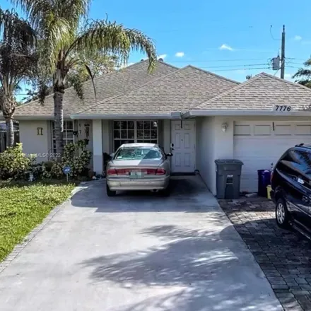 Buy this 4 bed house on 7924 Griswold Street in Palm Beach County, FL 33462