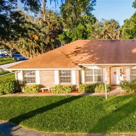 Buy this 4 bed house on 3427 Country Manor Dr in South Daytona, Florida