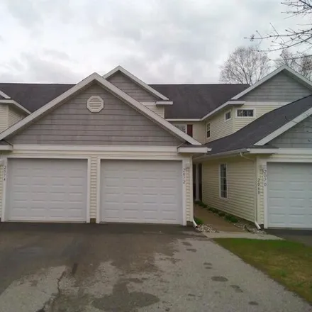 Buy this 2 bed condo on 2076 Chelsea Lane in Garfield Township, MI 49685