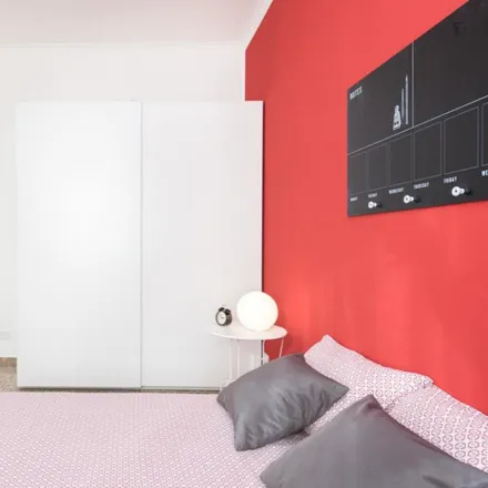 Rent this 2 bed room on Pizzalogia in Viale dello Scalo San Lorenzo, 85