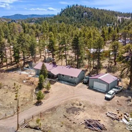 Buy this 3 bed house on 729 Hiawatha Highway in Red Feather Lakes, Larimer County