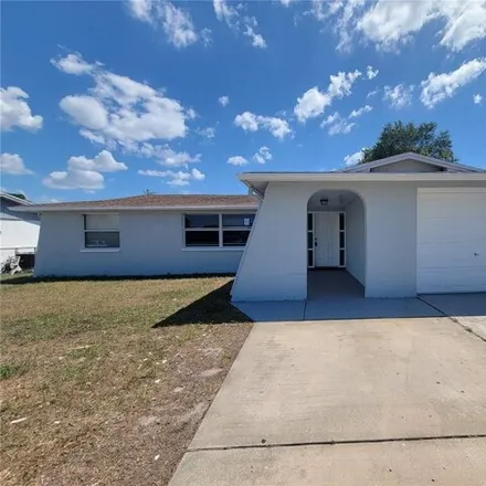 Rent this 3 bed house on 6052 12th Avenue in Elfers, FL 34653