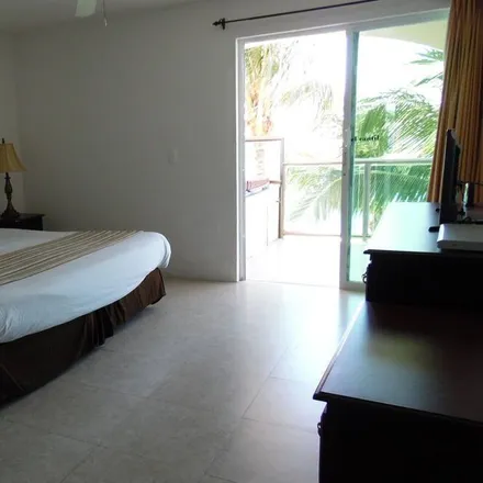 Rent this 4 bed condo on San Miguel de Cozumel in Cozumel, Mexico