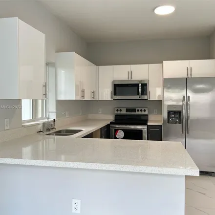 Rent this 3 bed apartment on 809 Northwest 16th Avenue in Fort Lauderdale, FL 33311