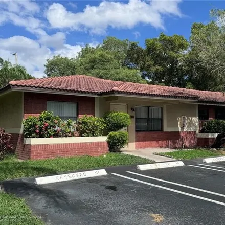 Buy this 2 bed house on 539 North University Drive in Coral Springs, FL 33071