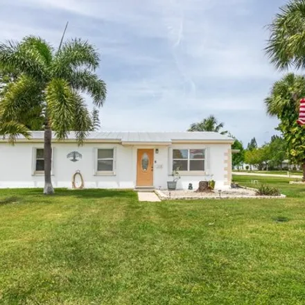Buy this 3 bed house on 824 Camelia Drive in Melbourne, FL 32901