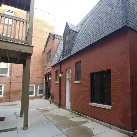 Rent this 4 bed house on 441 West Surf Street in Chicago, IL 60657