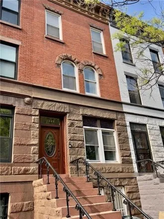 Buy this 6 bed house on 1209 Bergen Street in New York, NY 11216