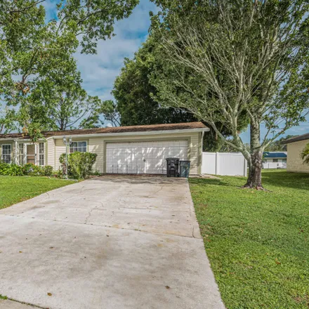Buy this 3 bed house on 699 Southwest Lakehurst Drive in Port Saint Lucie, FL 34983