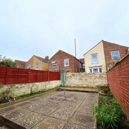 Rent this 4 bed townhouse on Percy Road in Portsmouth, PO4 0BH