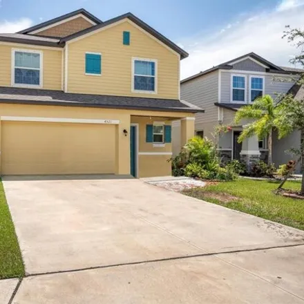 Buy this 4 bed house on Reisswood Loop in Manatee County, FL 34222