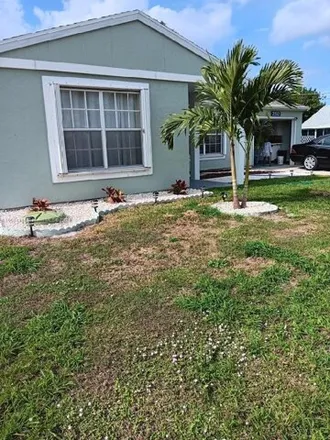 Rent this 3 bed house on 2218 Southeast Wald Street in Port Saint Lucie, FL 34984