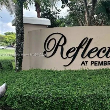 Rent this 2 bed condo on 2421 NW 96th Ter Unit 20E in Pembroke Pines, Florida